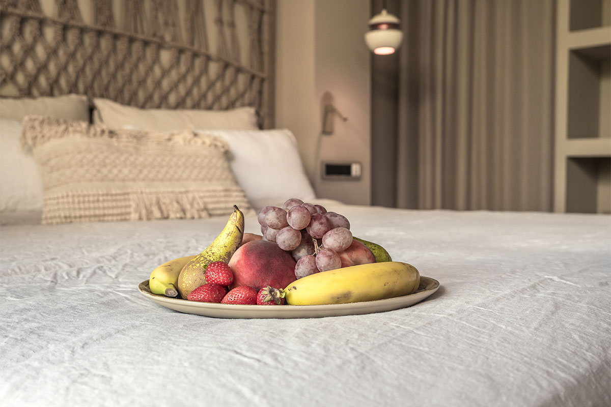 Welcome to the Barefoot Hotel Mallorca with a fresh fruit platter on your bed in the Comfort Double Room Puerto.