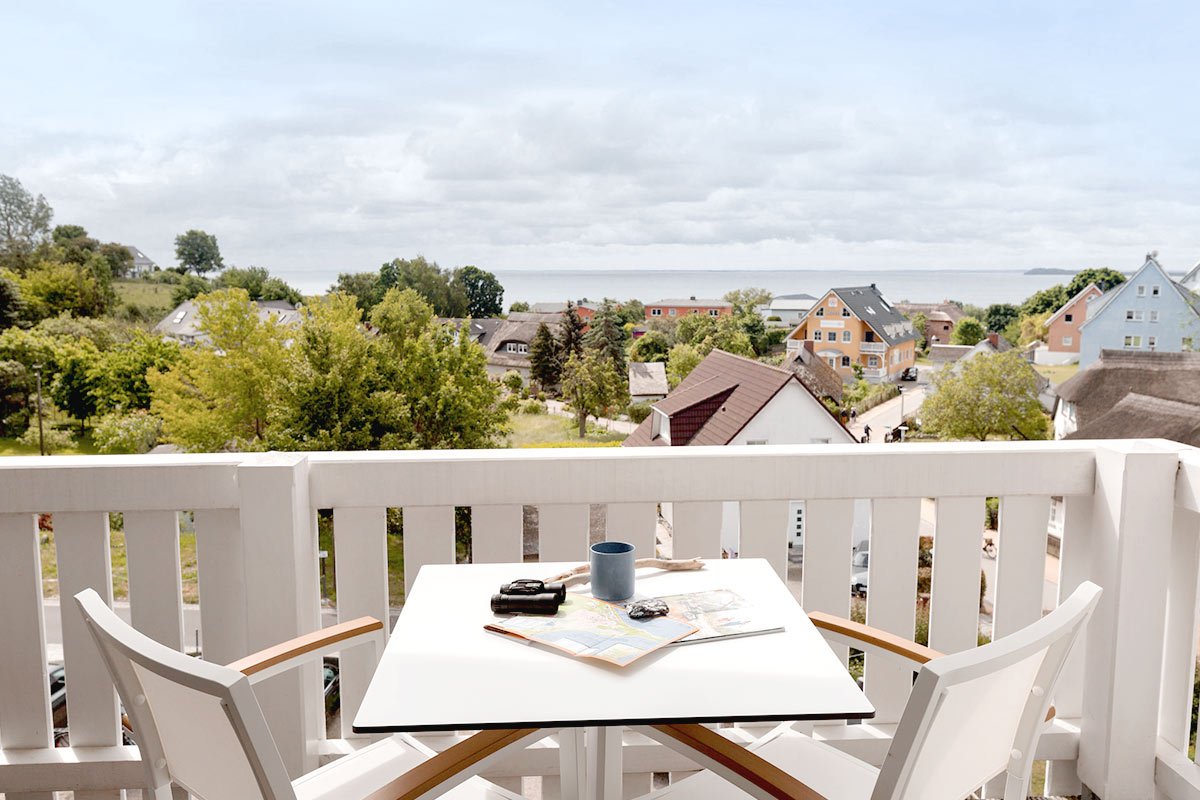 View from the balcony of Koopmanns Hotel and Lädchen Rügen over rooftops and Baltic Sea