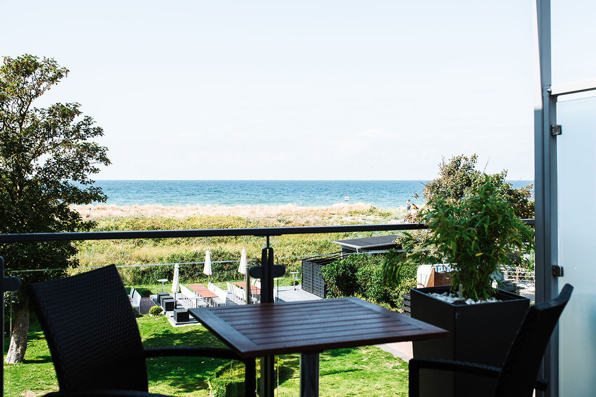 View of the Baltic Sea and the dunes from the balcony of the single room at Hotel Künstlerquartier Seezeichen.