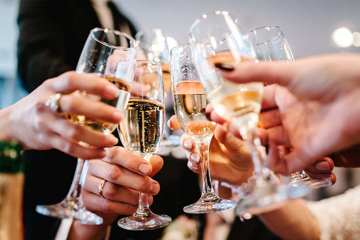 A group of people toast together at a gala evening.